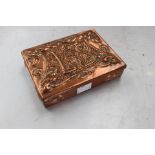 An Arts and Crafts copper box with repouse initials to the lid,