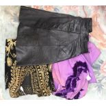 A black leather 1960, mini skirt, button down front,