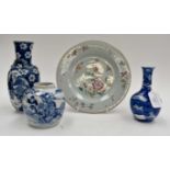 A collection of Chinese blue and white ceramics including ginger jar painted with warriors;