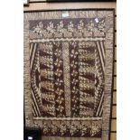 A West African painted artwork, natural paint in brown monochrome,