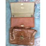 An alligator skin clutch bag by Paco Rabanne along with a kid lined alligator bag (2)