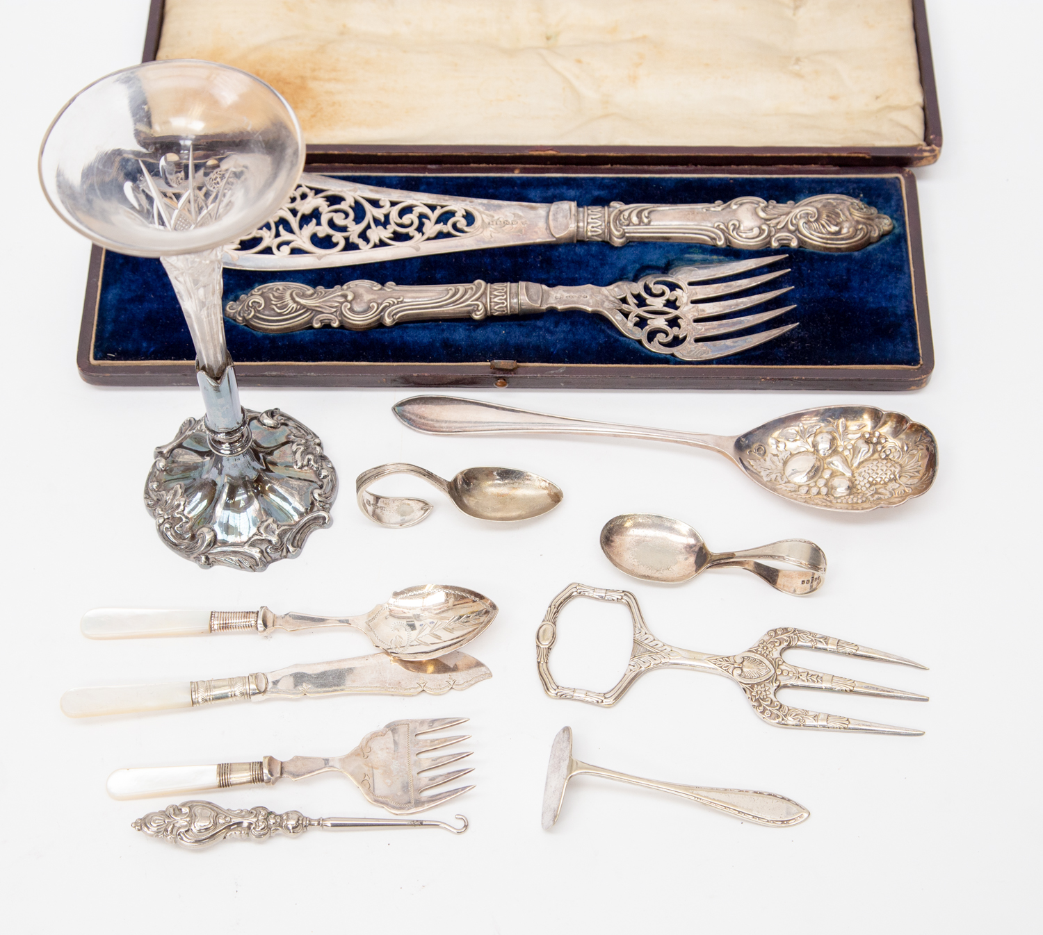 Group of silver plate and EPNS items including spoons, button hook, large fruit serving spoon, fork,