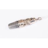 A Victorian style silver needle case, aesthetic applied design,