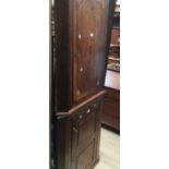 Two George III oak hanging corner cupboards, one inlaid , one panelled.