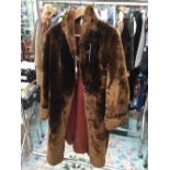 A beaver lamb midi brown coat,