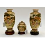 A pair of late 19th Century Meiji period hand painted Satsuma vases,