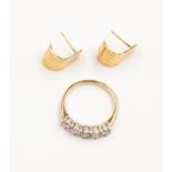 An unmarked pair of 9ct gold earrings, scallop shape, length approx 15mm, weight approx 2.