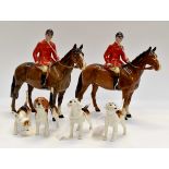 A Beswick hunts group, comprising two huntsmen on horseback,