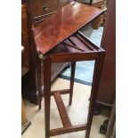 An Edwardian mahogany adjustable music stand.