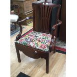 A mahogany Georgian armchair commode,