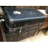 An early 20th Century travelling trunk, complete with a fitted interior,