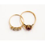 Two 9ct gold stone set dress rings,