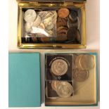 Two boxes of assorted coins, mostly copper, including a small bag of silver coins,