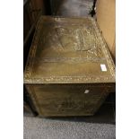 A brass faced wooden chest/coal box chest on casters.