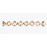 A 9ct gold fancy link bracelet, hollow open links with rectangular alternte links,