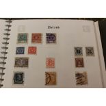 Stamp Album containing stamps from Newfoundland to Syria.