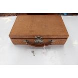 A tooled leather late 19th Century early 20th Century writing carry case, fully fitted with pens,