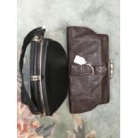 1940's leather clutch bag with metal clasp and late 1940's black leather bag with handle,