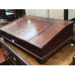 Mahogany desk top on bun feet,