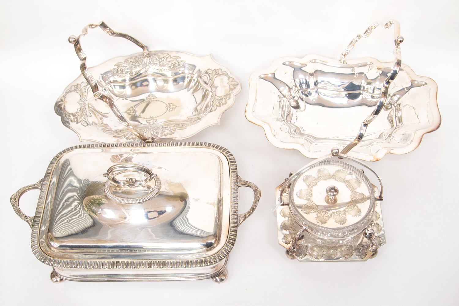 A collection of assorted silver plated items, including a 19th Century Sheffield plate entree dish,