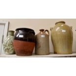 Three stoneware jars along with a Denby vase