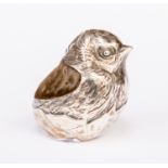 An Edwardian silver pin cushion, modelled as a hatching chick, Sampson Mordan & Co, Chester 1906,