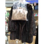 A three quarter musquash shaded jacket, 1950's with a mink blonde stole,