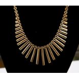 A 9ct gold Cleopatra fringe necklace, length approx 15.5'', total weight approx 27.