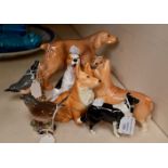 Collection of Beswick dogs and garden birds