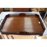 A late Victorian mahogany lattice work butlers tray,