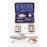 A small selection of silver to include an Exeter 1818 silver tablespoon,