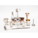 A collection of silver including: a George III silver cruet frame,