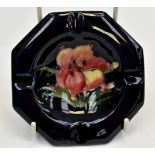 A Moorcroft African Lily pattern ashtray,