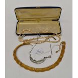 A 1950's gold plated mesh and faux turquoise necklace,