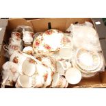 Royal Albert Country Roses tea service, six cups, saucers and plates, tea pot, milk / sugar,