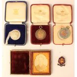 Two Coventry Silver School attendance medals, together with a registry office centenary medal 1937,