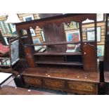 George III oak dresser and rack, three drawers with cabriole legs.