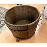 A 19th Century oak iron bound and brass footed coal bucket,