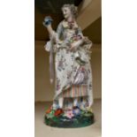 Large Continental figure of a lady holding flowers