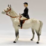 A Beswick hunts woman on horseback, opaque,