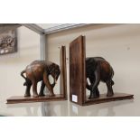 Two early 20th Century wooden elephant book ends,