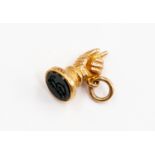 A Victorian hand and bloodstone seal fob, unmarked yellow metal, total gross weight approx 8.