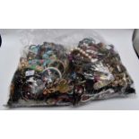 Two bags of assorted costume jewellery