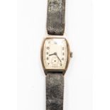 A silver cased Art Deco silver gents watch, marked Edinburgh, elongated white enamelled dial,