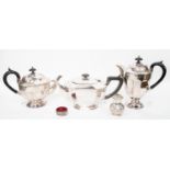 Three plated tea pots, 20th Century, along with an early 20th Century pepper pot,