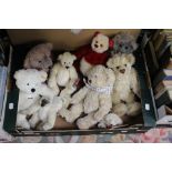 A collection of Teddy Bears, some limited edition designer examples, most with tags.