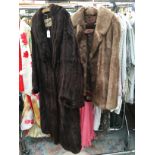 A Colman and Sumberg full length 1950's squirrel fur coat with a good lining with flowers and a