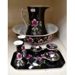 A wash stand jug and bowl, a matching seven piece dressing table set, Staffordshire,