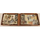 Two cigar boxes of cigarette cards