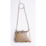 A ladies silver evening purse with finger hoop kid leather lined with divisions,
